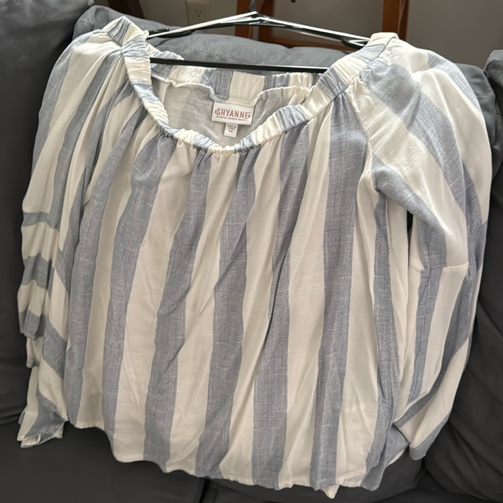 Shyanne over the shoulder blouse bell sleeves.